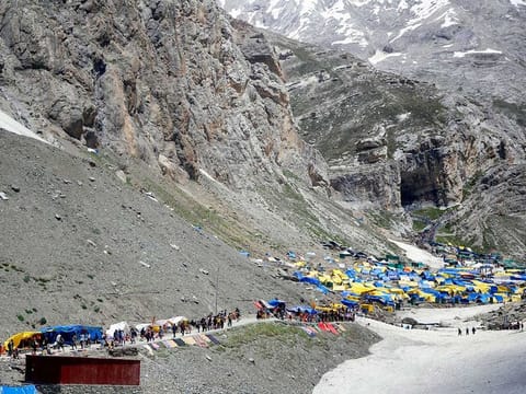 Hindu devotees on their way to the holy cave shrine of Amarnath, at Pahalgam in Anantnag district of Jammu and Kashmir