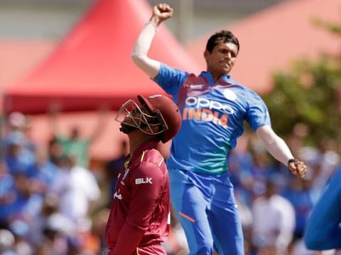 West Indies' Shimron Hetmyer, left, reacts as he is bowled by India's Navdeep Saini, right, during the first Twenty20 international cricket match, on August 3, 2019, in Lauderhill, Florida. 