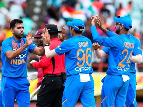 Deepak Chahar (left) of India celebrates the dismissal of Sunil Narine of West Indies during the 3rd T20i at Guyana National Stadium in Providence, Guyana, on August 6, 2019.  