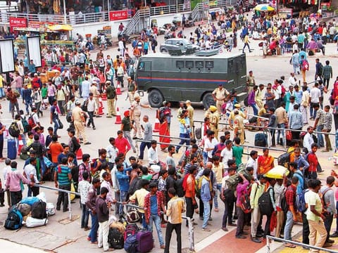 Passengers at a railway station in Jammu, Wednesday, Aug 7, 2019. 