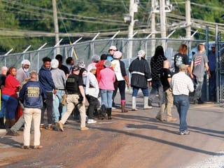 Scores from Mexico, Guatemala detained in Mississippi raids