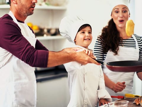 Family making pancakes