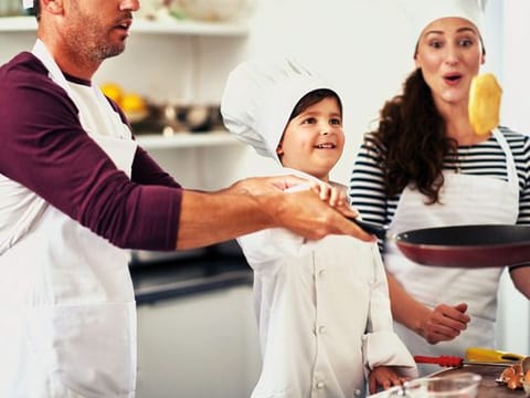 Family making pancakes
