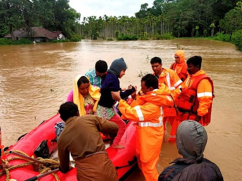 Rescue personnel during rescue operations at a flood affected area in Wayanad, on August 10, 2019. 