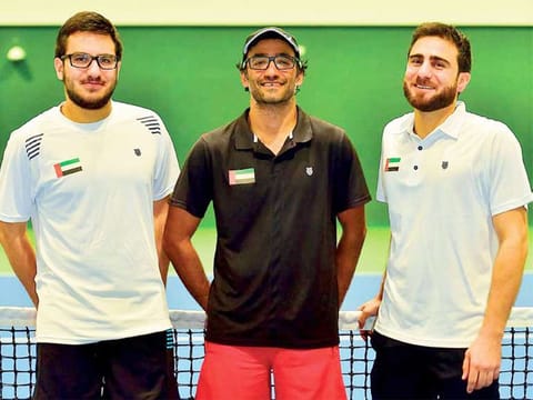From left: Fahad Abbas Al Janahi, Omar Bahroozian Al Awadhi and Hamad Abbas Al Janahi during practice at Al Habtoor City Tennis Academy.  
