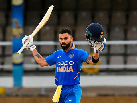 Virat Kohli of India celebrates his century during the 3rd ODI match between West Indies and India at Queens Park Oval, Port of Spain, Trinidad and Tobago, on August 14, 2019. 