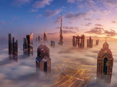 Dubai Downtown is seen during a beautiful foggy morning. 