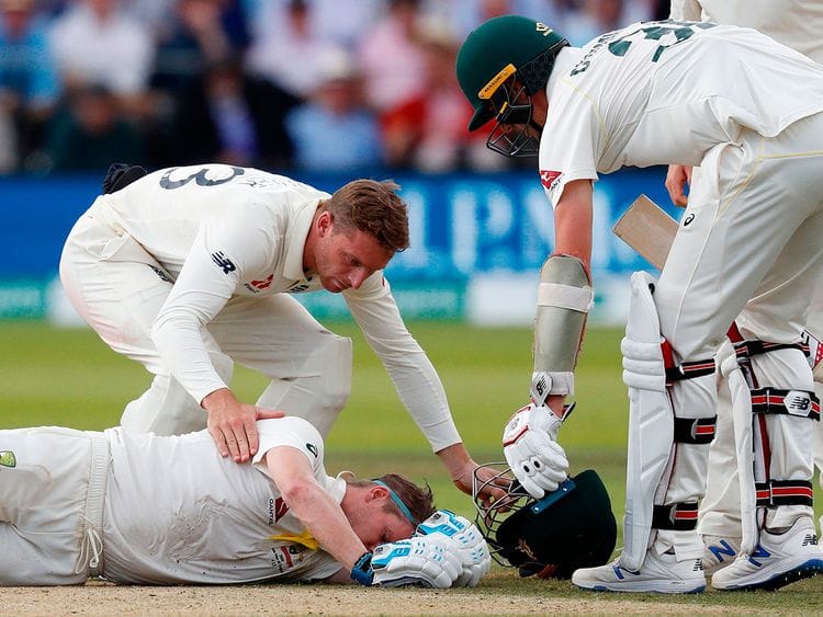 Australia's Steve Smith lays on the pitch