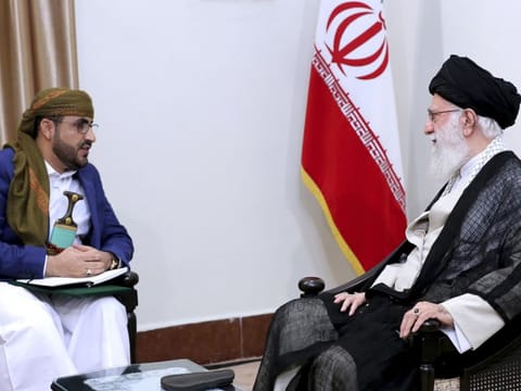 In this picture released by an official website of the office of the Iranian supreme leader, Supreme Leader Ayatollah Ali Khamenei, right, listens to Mohammed Abdul-Salam, spokesman for the Yemen Houthis rebels during their meeting at his residence in Tehran, Iran, Tuesday, Aug. 13, 2019. 