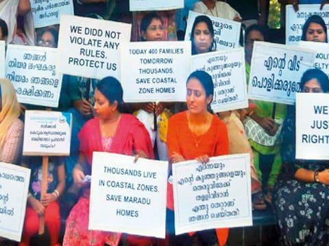 The 350 owners of five apartment buildings in Maradu that are marked for demolition held a protest fast in front of the municipality.