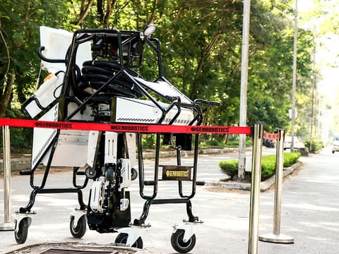 A bit like a giant spider with a bucket, the pneumatic robot can be lowered into a manhole to unblock drains and collect and deposit any debris above ground