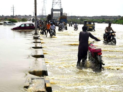 A flooded street in Karachi. The handling of the flooding offered a glaring example of the malaise afflicting the administration.