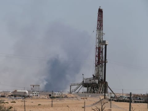 Smoke is seen at the Aramco facility in the eastern city of Abqaiq, Saudi Arabia, September 14, 2019.