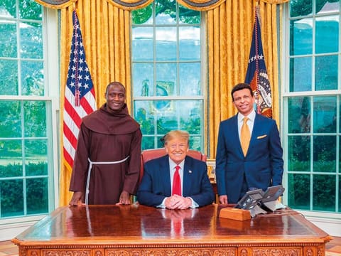 Donald Trump with Peter Tabichi and Sunny Varkey during a meeting at the White House on Monday.