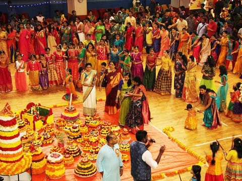 Married women turned up in silk saris and dazzling jewellery while young girls in beautiful dresses accompanied their mothers for the annual festival of flowers.