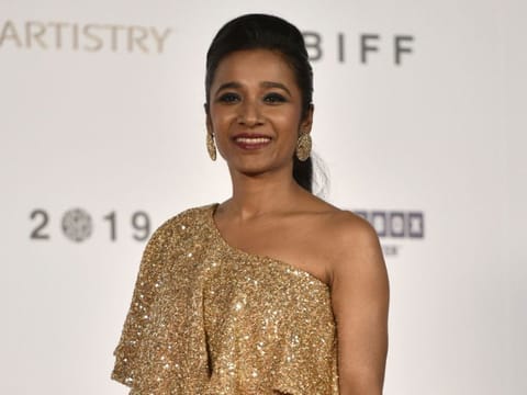 This picture taken on October 3, 2019 shows Indian film actress Tannishtha Chatterjee on the red carpet during the opening ceremony of the Busan International Film Festival (BIFF) in Busan.