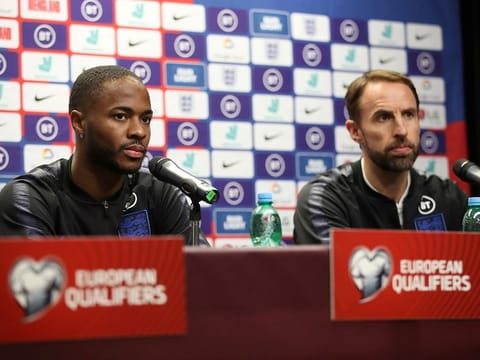 England's Raheem Sterling and England manager Gareth Southgate during the press conference.
