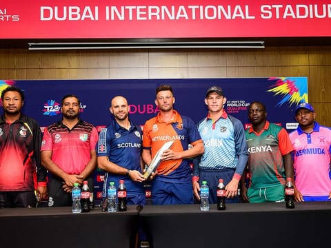 Team captains (from left) Asadollah Vala of Papua New Guinea, Amjad Mahboob of Singapore, Kyle Coetzer of Scotland, Pieter Seelaar of Netherlands, Merwe Erasmus of Namibia, Shem Ngoche of Kenya and Dion Stovell of Bermuda at the pre-tournament conference for the ICC Men's T20 World Cup Qualifier. 