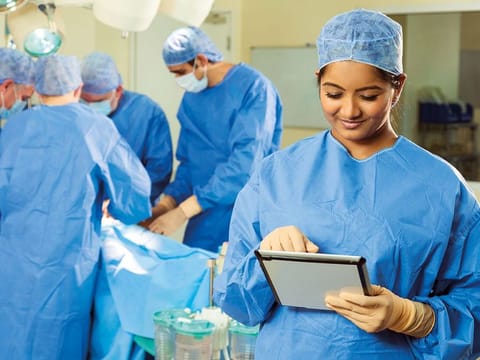 Nurses go about their work helping others, giving a helping hand, showing compassion