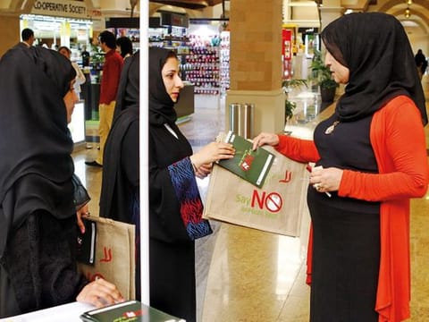 Dubai Municipality officials distributing jute bags during the launch of the “Say No To Plastic Bags?” campaign. 