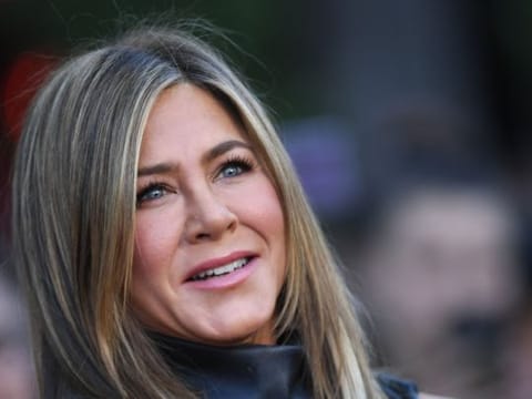 Jennifer Aniston arrives to attend the Los Angeles premiere screening of the Netflix film "Murder Mystery" at the Regency Village Theatre in Los Angeles.