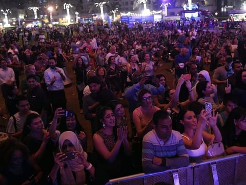 Crowd enjoying Al Jasmi concert.