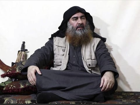 This file image made from video posted on a militant website April 29, 2019, purports to show the leader of the Islamic State group, Abu Bakr al-Baghdadi, being interviewed by his group's Al-Furqan media outlet.
