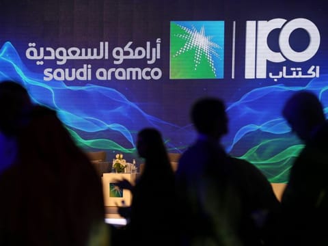 A sign of Saudi Aramco's initial public offering (IPO) is seen during a news conference by the state oil company at the Plaza Conference Center in Dhahran, Saudi Arabia November 3, 2019