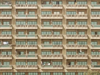 Woman killed after being pushed off 18th floor
