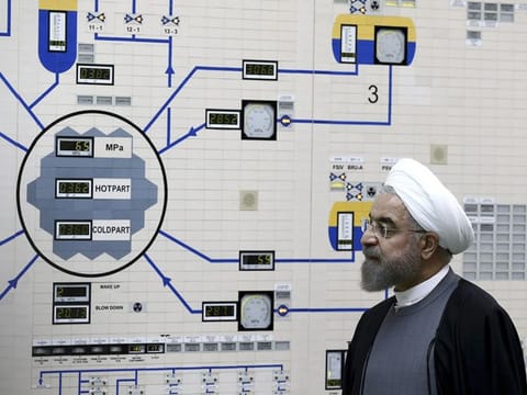 In this January 13, 2015, file photo, President Hassan Rouhani visits the Bushehr nuclear power plant. Iran announced Tuesday it would inject uranium gas into 1,044 centrifuges it previously kept empty under its 2015 nuclear deal with world powers. 
