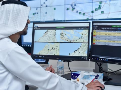 A Hassantuk officer monitors the fires on his screen at the operation centre of Hassantuk. 
Supplied by Hassantuk