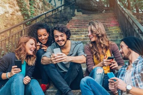Everyone whips out a smartphone to catch the latest headlines