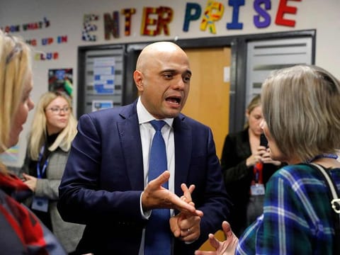 Britain's Chancellor of the Exchequer Sajid Javid greets the general public during a tour of Bolton Lads & Girls club in Bolton, Britain, November 26, 2019.