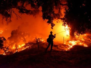 In pictures: Fast-moving fire threatens Santa Barbara County