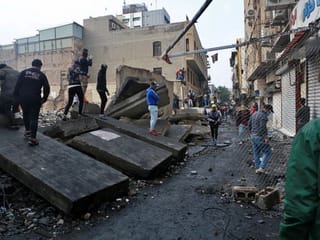 Talks in Iraq capital as violence hits shrine cities