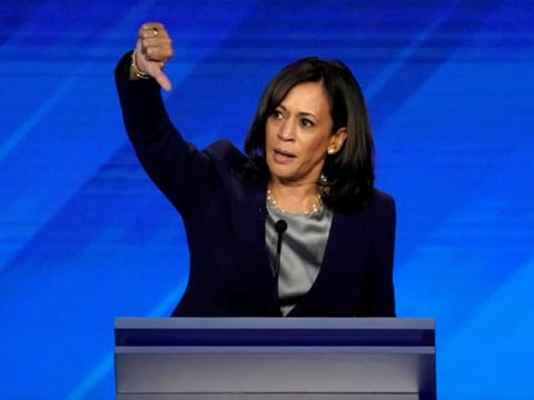 FILE PHOTO: Senator Kamala Harris gestures as she speaks during the 2020 Democratic presidential debate in Houston, Texas