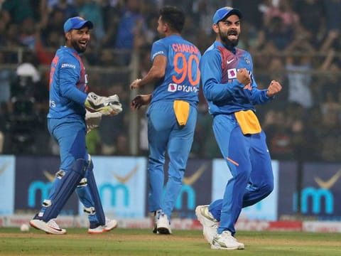 India's captain Virat Kohli celebrates the dismissal of West Indies' Nicholas Pooran during the third Twenty20 international cricket match between India and West Indies in Mumbai, India, Wednesday, Dec. 11, 2019.
