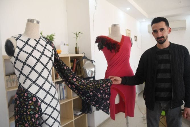 REG 191212  RUBBISH omari with his dresses-1576224265507