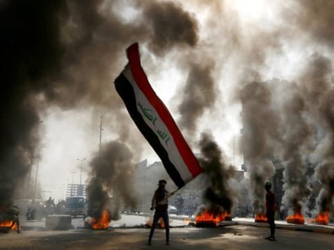 An Iraqi protester during the ongoing anti-government protests in Najaf, Iraq.