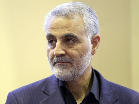 (FILES) In this picture taken on September 14, 2013, the commander of the Iranian Revolutionary Guard's Quds Force, Gen. Qasem Soleimani, receives condolences following the death of his mother in Tehran.  Top Iranian commander Qasem Soleimani was killed in a US strike on Baghdad's international airport on January 3, 2019, Iraq's powerful Hashed al-Shaabi paramilitary force has said, in a dramatic escalation of tensions between Washington and Tehran. / AFP / ISNA / MEHDI GHASEMI