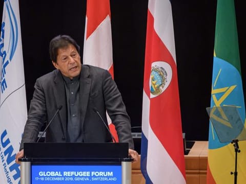 Pakistan's Prime Minister Imran Khan delivers a speech during the opening of the Global Refugee Forum in Geneva