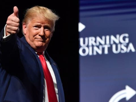 US President Donald Trump arrives for the Turning Point USA Student Action Summit at the Palm Beach County Convention Center in West Palm Beach, Florida