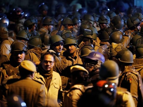 Police in riot gear stand guard inside the Jawaharlal Nehru University (JNU) after students were attacked in one of India's most prestigious universities on January 5, 2020
