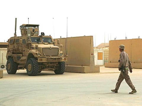 In this Nov. 8, 2017, file photo, U.S. Marines are stationed in Ain Al Asad air base in Iraq. 
