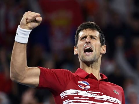 File image: Novak Djokovic celebrates beating Rafael Nadal in the ATP Cup.