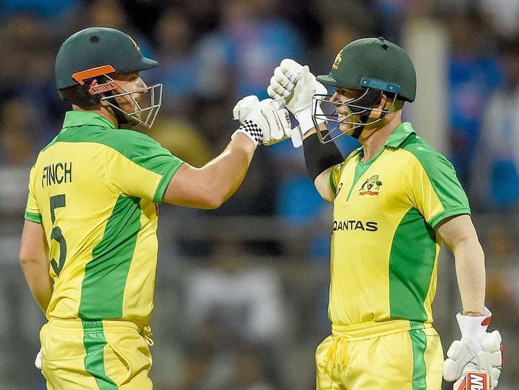 Aaron Finch (L) and teammate David Warner