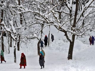 Photos: Heavy snowfall paralyses life in Kashmir Valley