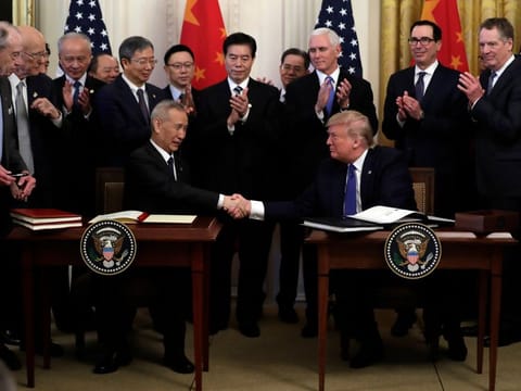 President Donald Trump and Chinese Vice Premier Liu He sign “phase one” of a US China trade agreement, in the East Room of the White House, Wednesday, Jan. 15, 2019, in Washington. (AP Photo/ Evan Vucci)  President Donald Trump speaks before signing “phase one” of a US China trade agreement with Chinese Vice Premier Liu He, in the East Room of the White House, Wednesday, Jan. 15, 2019, in Washington. (AP Photo/ Evan Vucci)  Chinese Vice Premier Liu He speaks before signing “phase one” of a US China trade agreement with President Donald Trump, in the East Room of the White House, Wednesday, Jan. 15, 2019, in Washington. (AP Photo/ Evan Vucci)