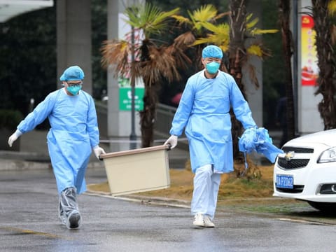 Medical staff at the Jinyintan hospital, where the patients with pneumonia caused by the new strain of coronavirus are being treated, in Wuhan, Hubei province, China, on January 10, 2020. 