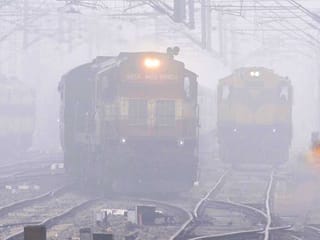 Photos: Dense fog engulfs North India